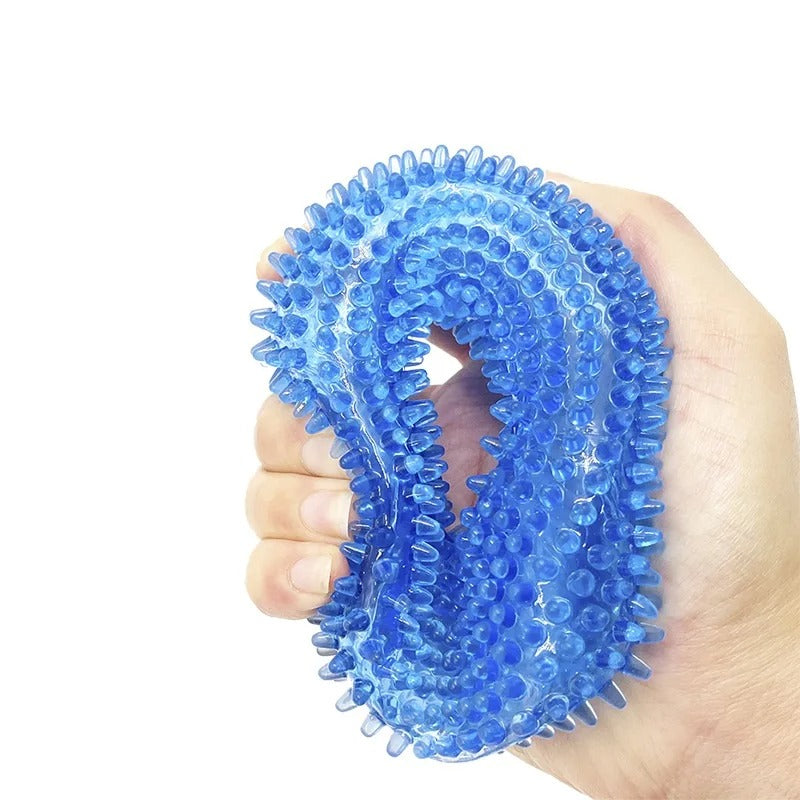 Juguete masticable para perros con púas y ganchos